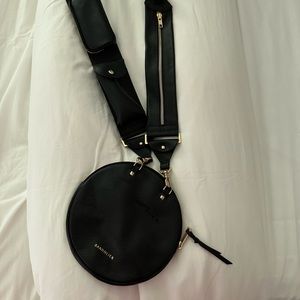 Bandolier utility strap with accessories purse.